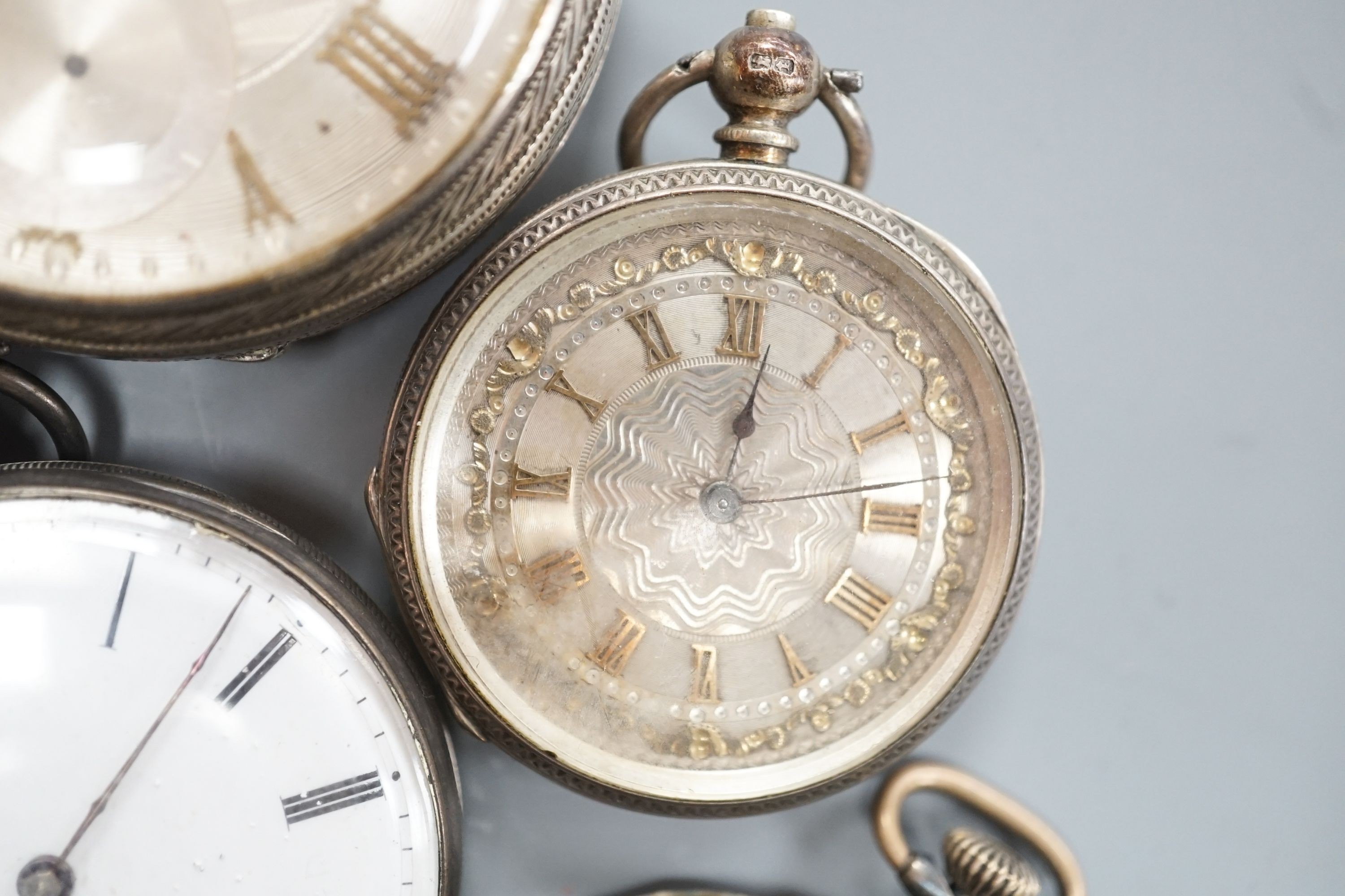 Six assorted late Victorian and later silver or white metal pocket watches, including J.W. Benson.